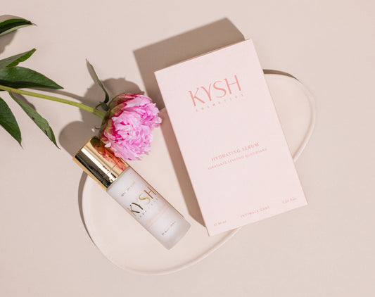 KYSH hydrating serum product with a pink flower and box on a beige background